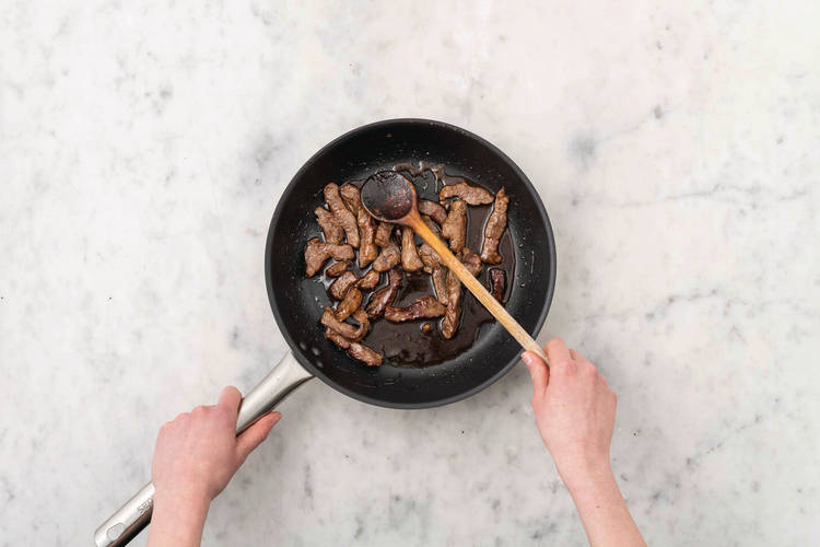 Cook the beef strips