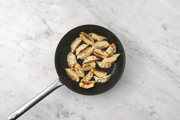 Cook the gyozas