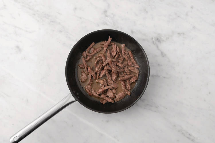 Cook the beef strips