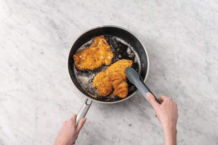 Cook the crumbed chicken