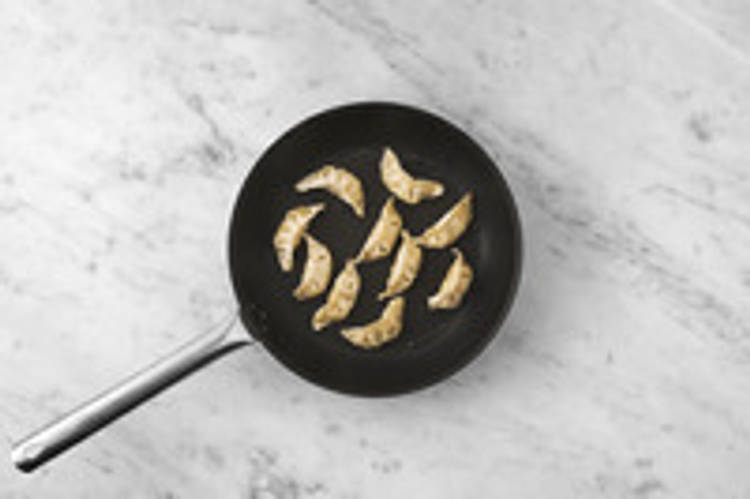 Cook the veggie gyozas
