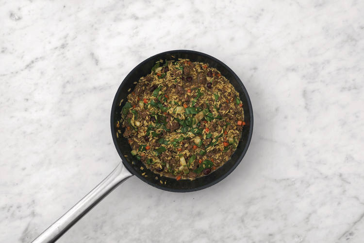 Add the rice & currants