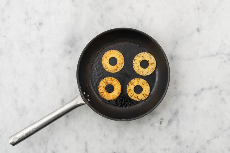 Char the pineapple and onion