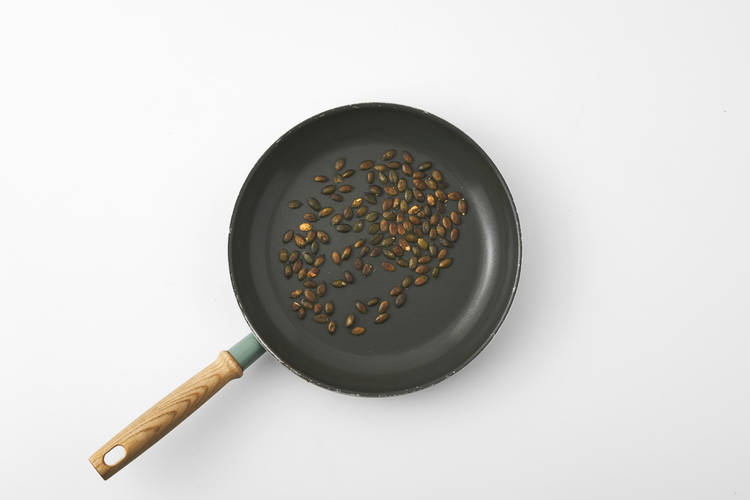 Toast the pumpkin seeds