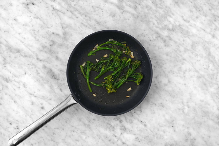 Get prepped and sauté the baby broccoli