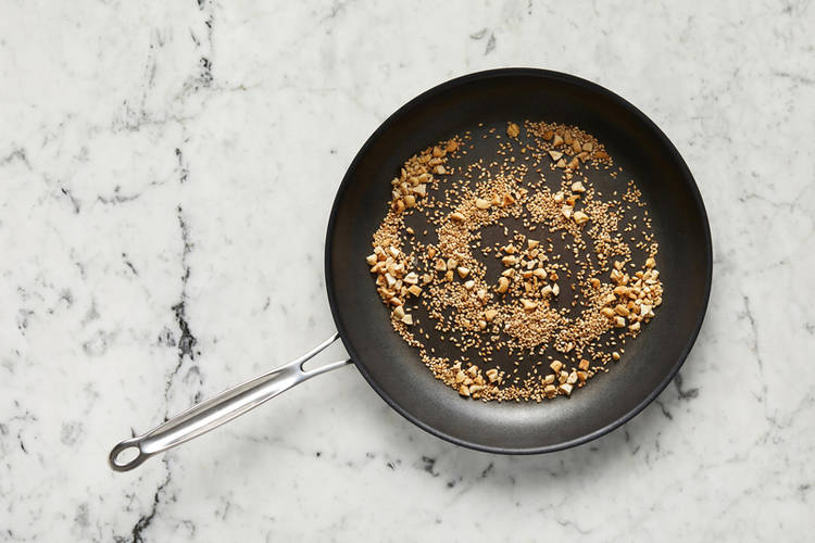Toast sesame seeds and cashews