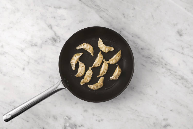 Cook the veggie gyozas