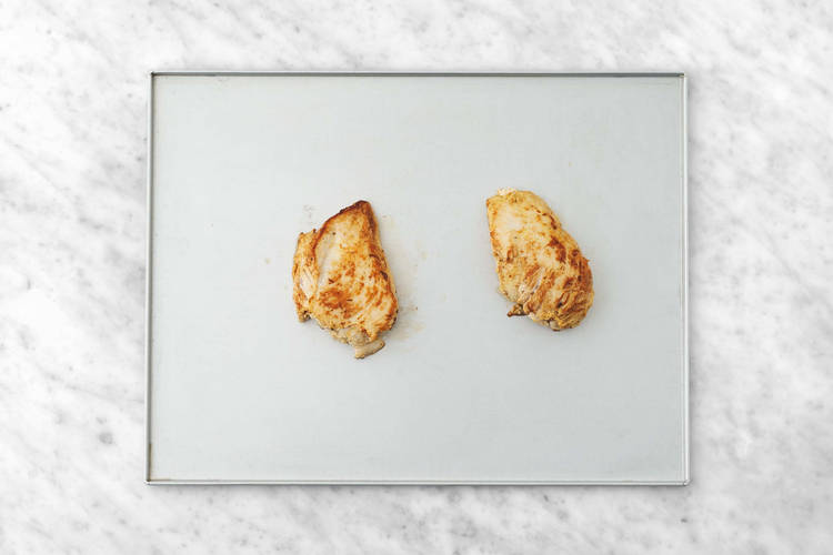 Bake casserole and cook chicken