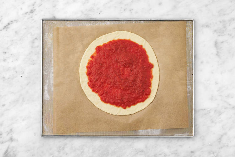Toppa med tomatsås