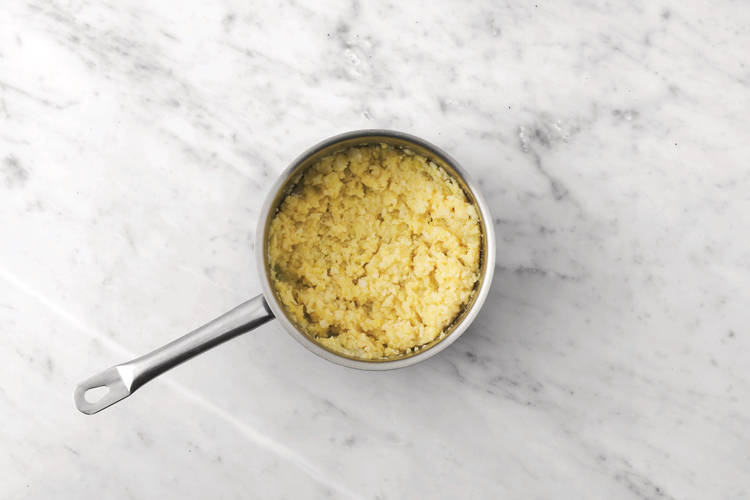 Make the mustardy cauli mash
