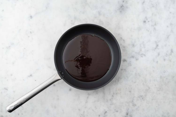 Cook the sauce & toss the slaw