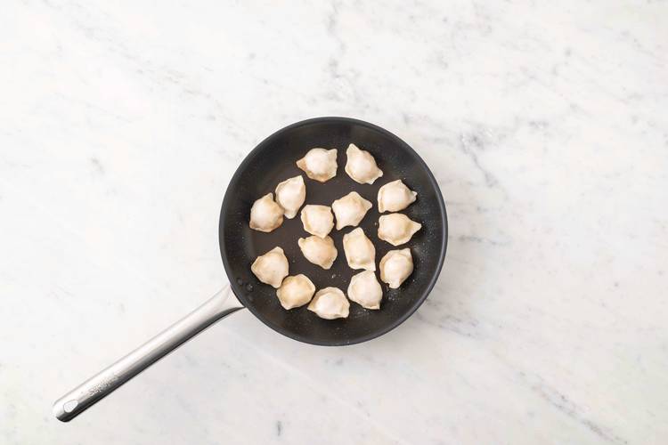 Cook the gyozas