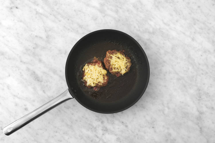 Cook the patties & halloumi