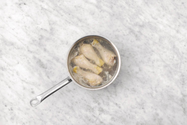 Poach the drumsticks