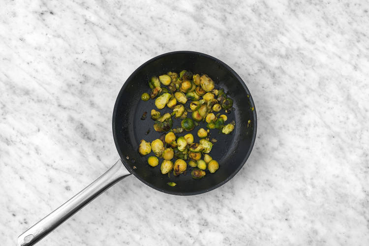 Get prepped & sauté the Brussels sprouts
