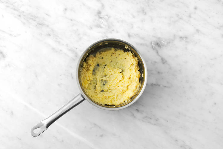 Make the cheesy mash