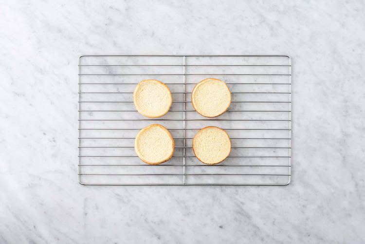 Melt the cheese & heat the buns