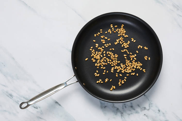 Toast pine nuts
