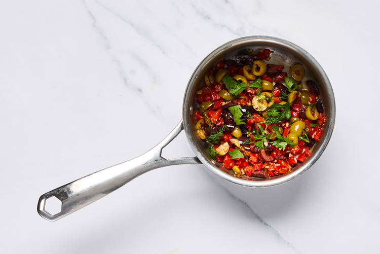 Cook potatoes and make herby relish