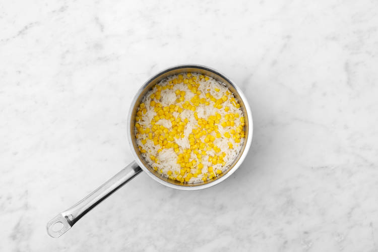 Cook the corn rice 