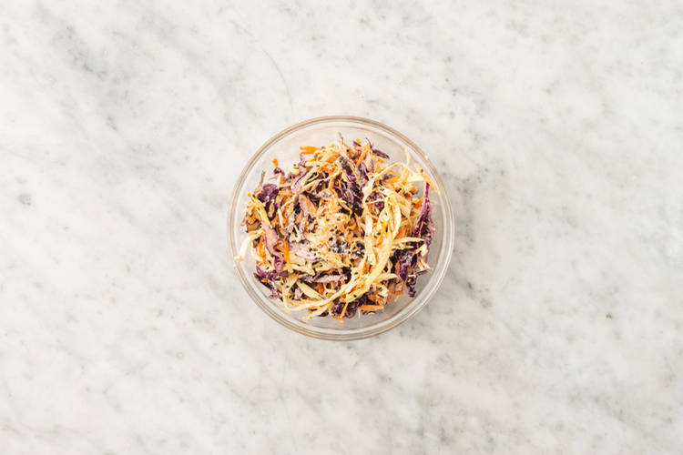 Toss the slaw & heat the tortillas 