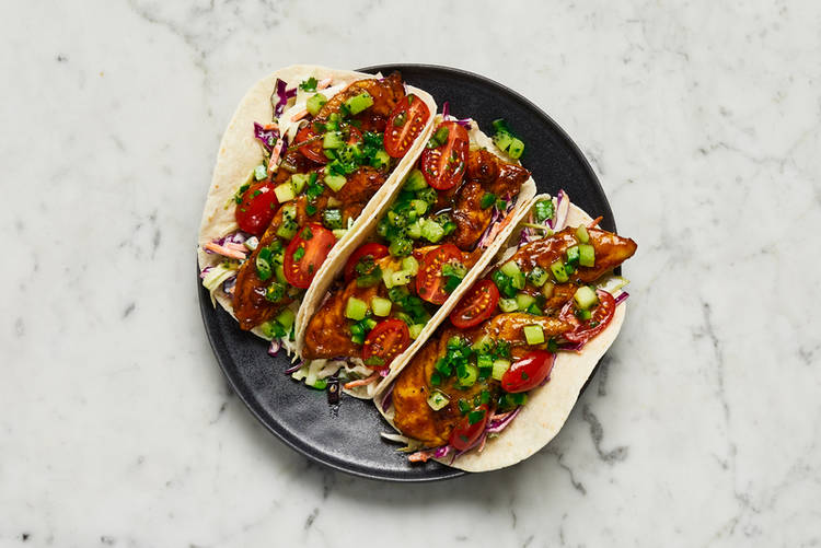 Heat tortillas and serve