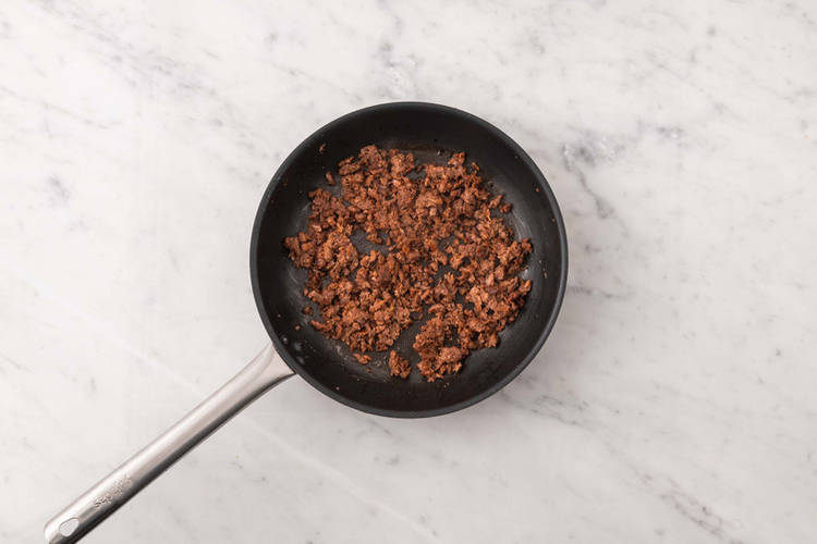 Cook chicken and plant-based protein shreds