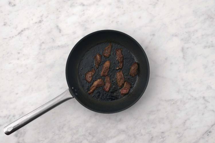 Cook the beef & halloumi