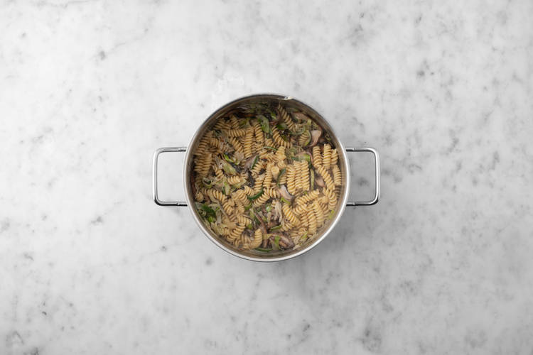 Add the pasta & cook the chicken