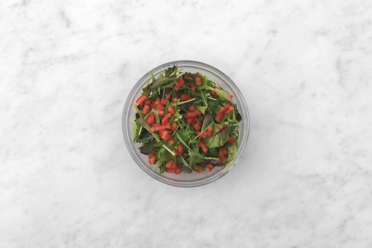 Heat flatbreads and make salad