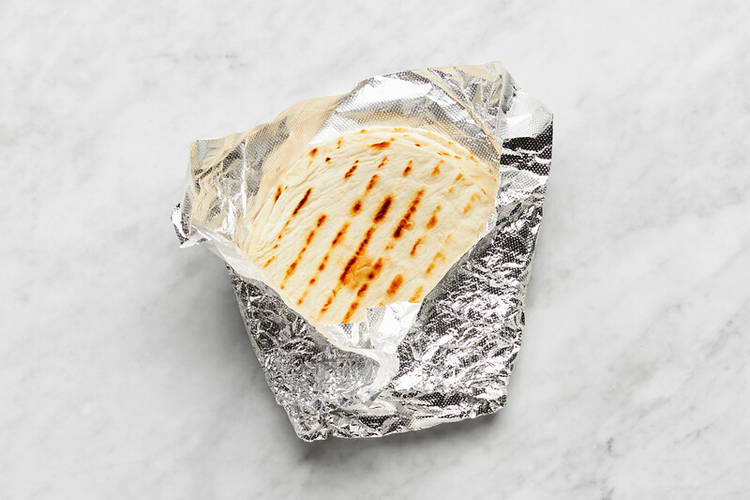 Warm tortillas and finish salmon