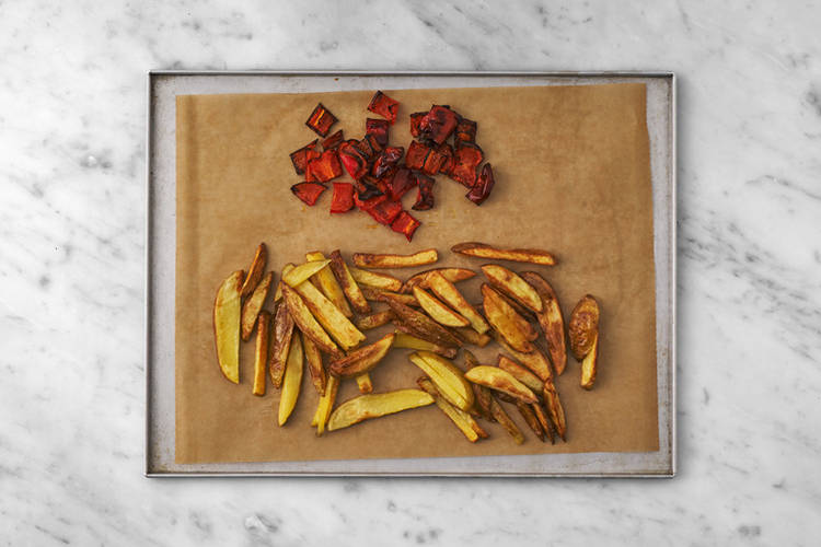 Bake the fries & the roast the capsicum