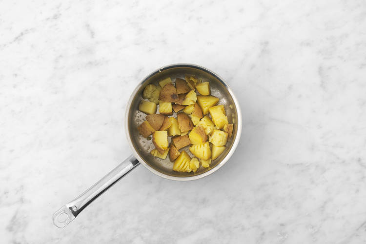 Make the garlic crushed potatoes