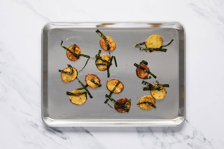 Roast potatoes and prep nori strips