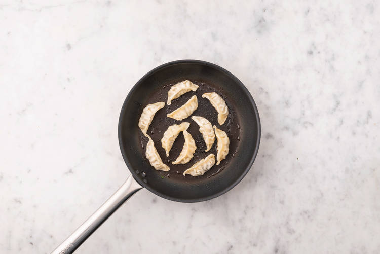 Cook the gyozas & prawns