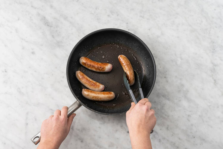 Cook the pork sausages
