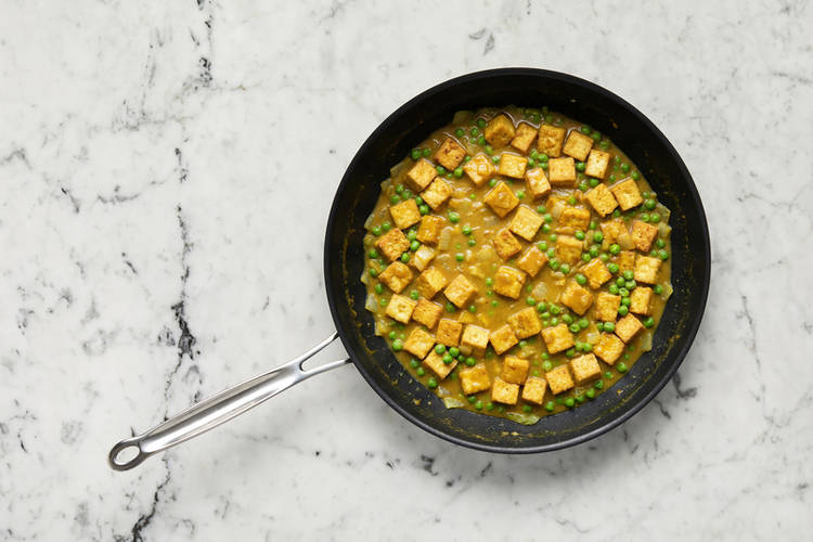 Cook peas and onions