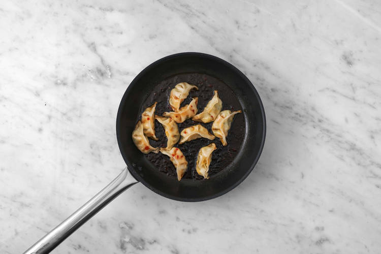 Fry the Gyozas & Prawns