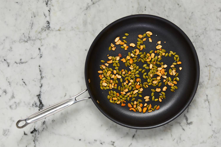 Toast cashews and pepitas