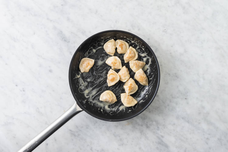 Cook the gyozas