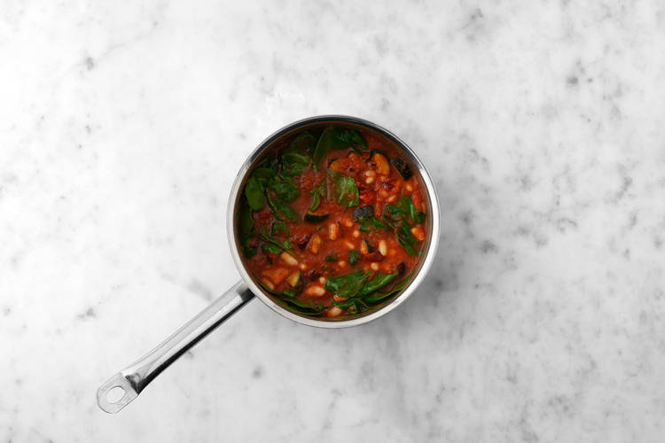 Cook the soup & bake the tortillas 