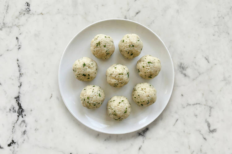 Form arancini and heat oil 