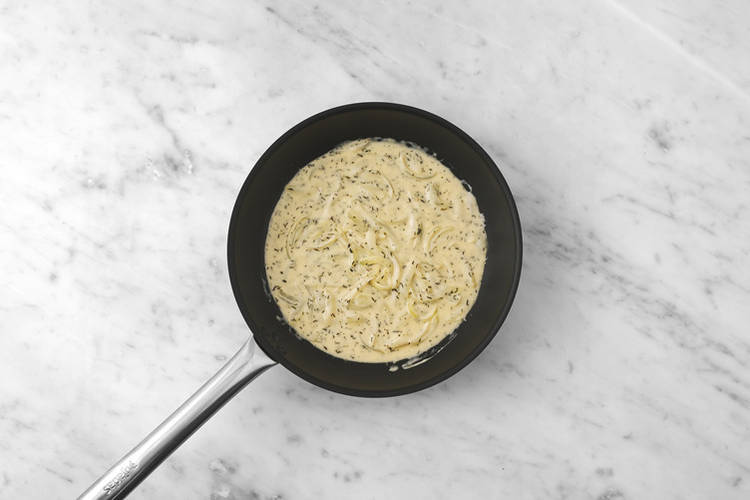 Make the creamy onion sauce