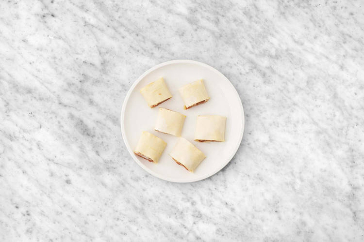 Assemble the sausage rolls