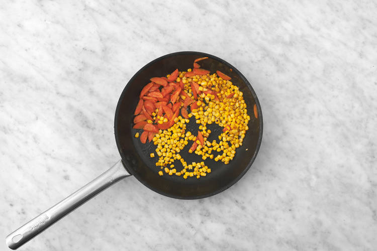 Cook the carrot and corn