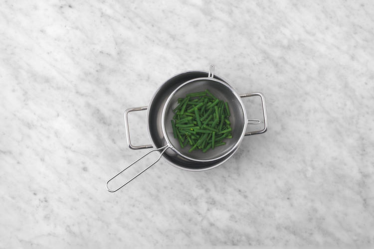 Boil the eggs & steam the green beans