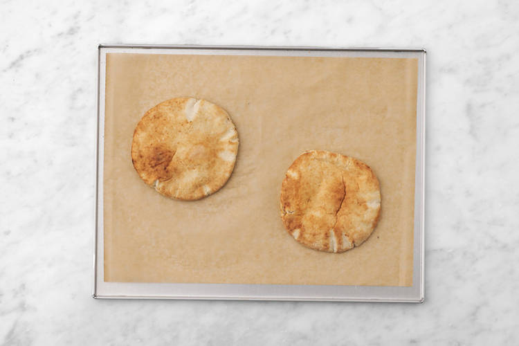 Toast the pita bread