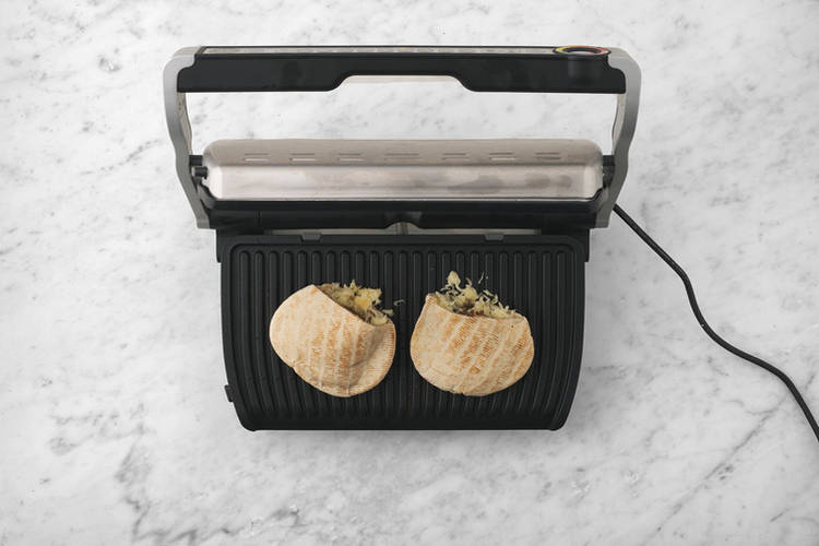 Toast the pita pockets