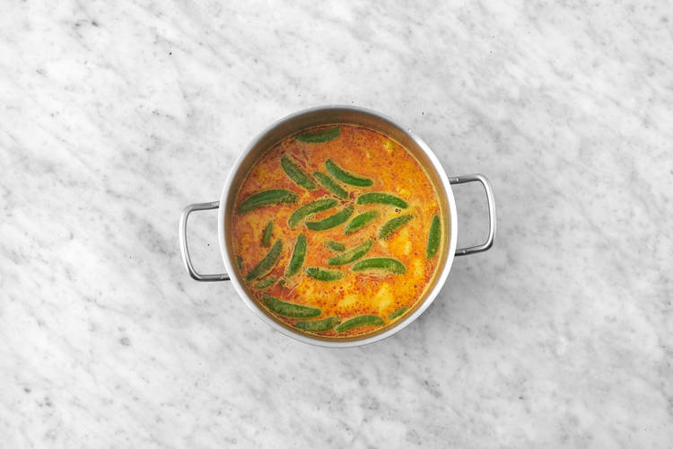 Cook sugar snap peas and noodles