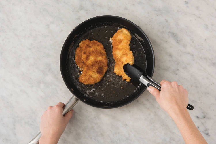 Cook the chicken schnitzel